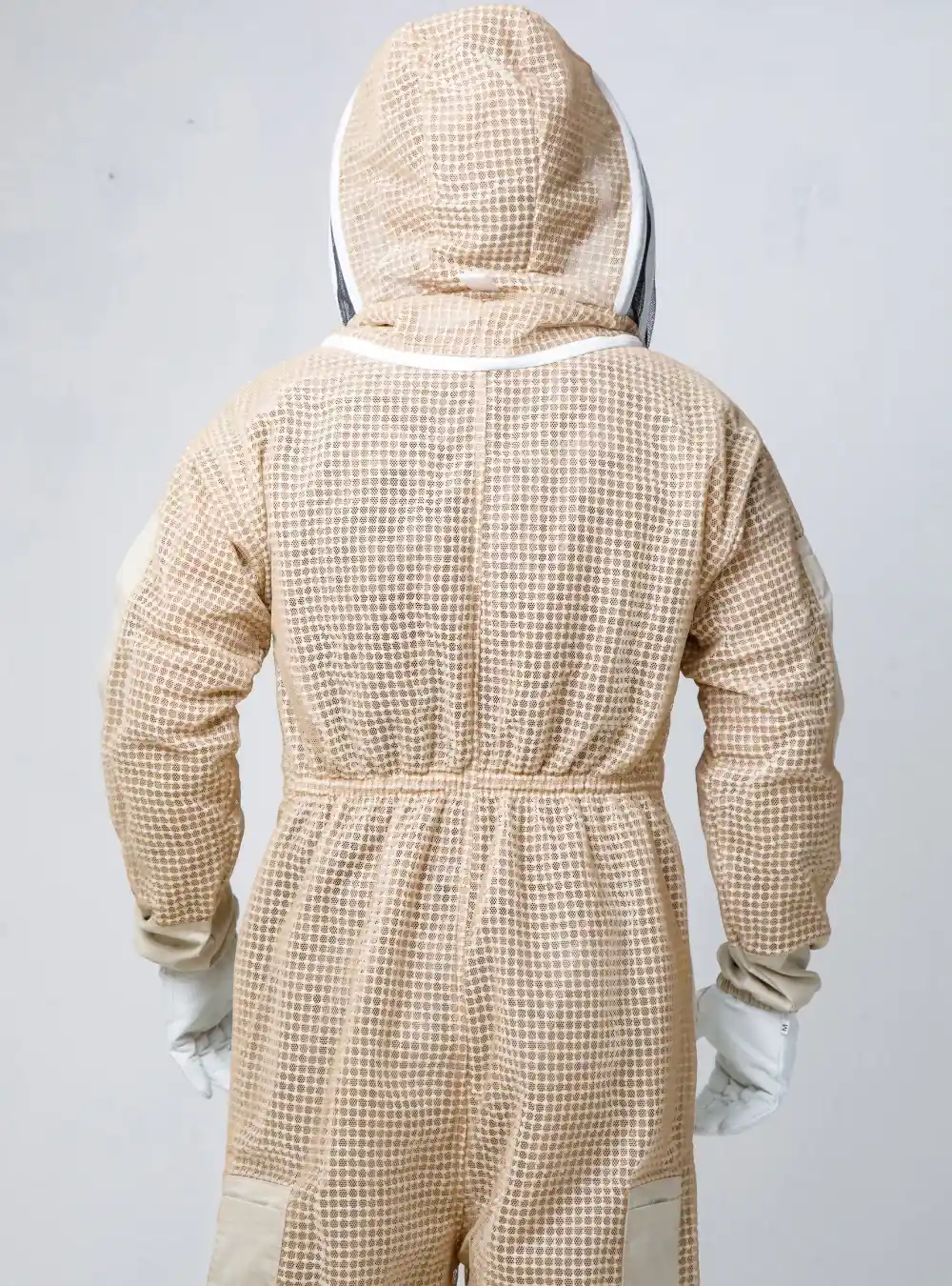 Back view of a ventilated beekeeping coverall showing the mesh fabric and hood